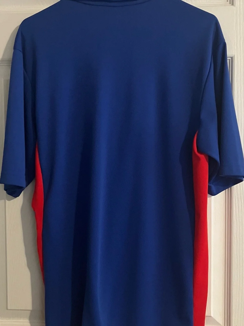 Youth New York Giant’s Royal Blue Polo with Red Side Panels Size M